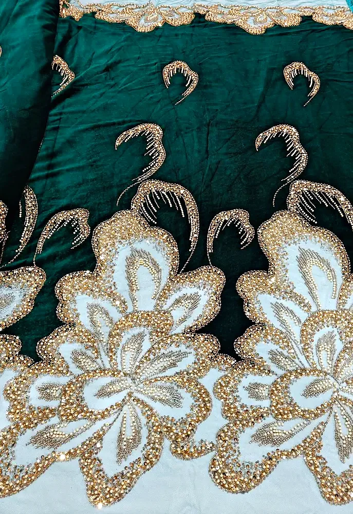 Emerald beaded velvet with a white cut-work border